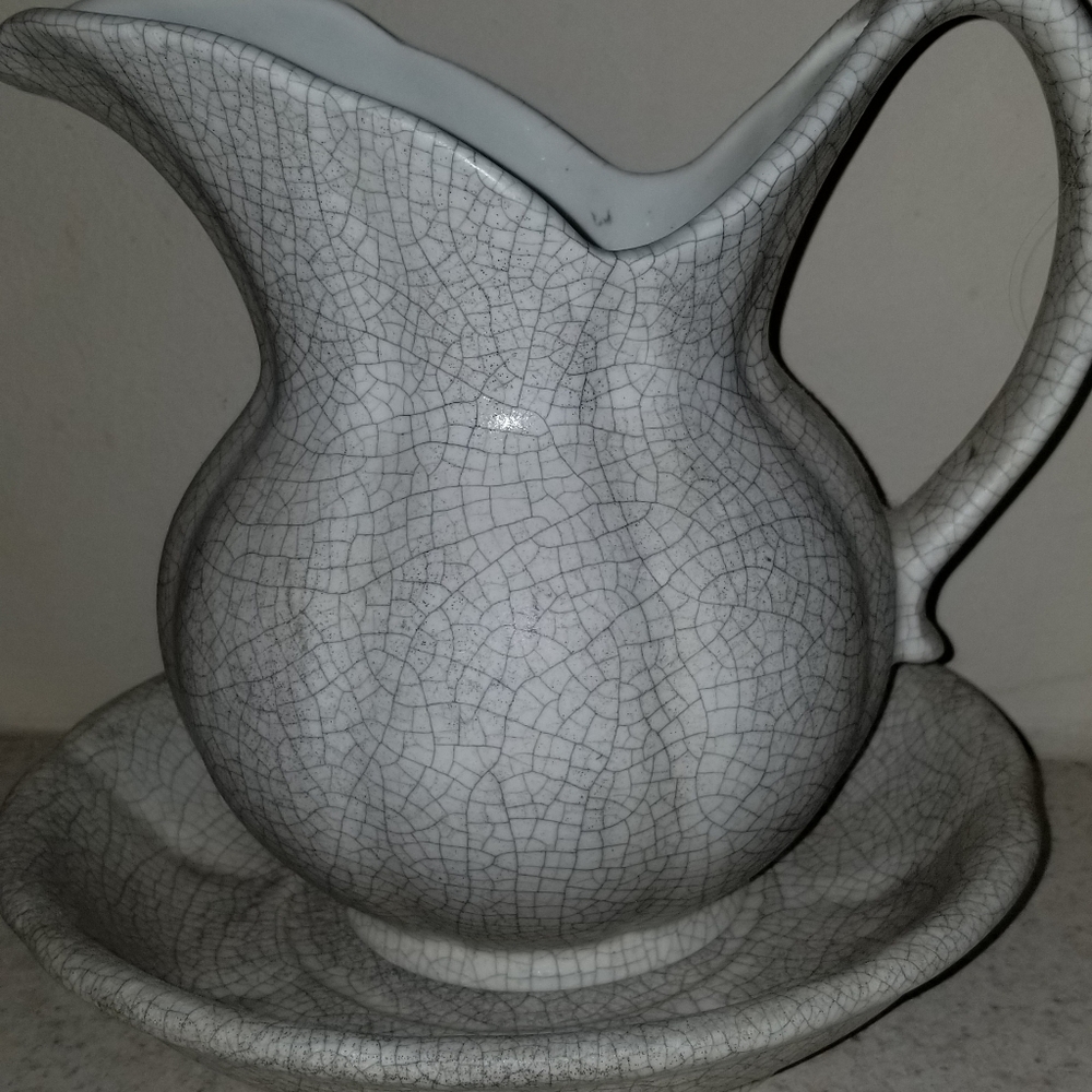 Pitcher with saucer